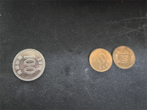 동전 100원 1개와 10원 2개